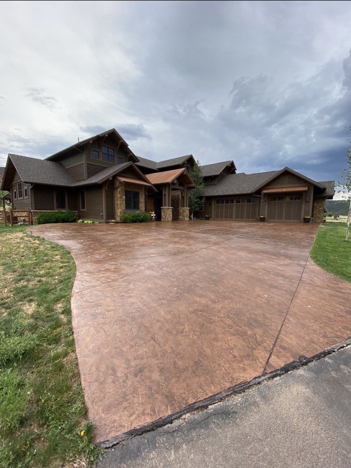Restored stamped concrete driveway at a mountain home